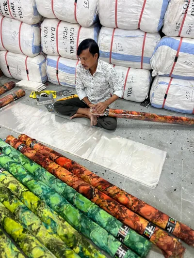 Wrapping printed fabric rolls (5 and 15 yard cuts) for export