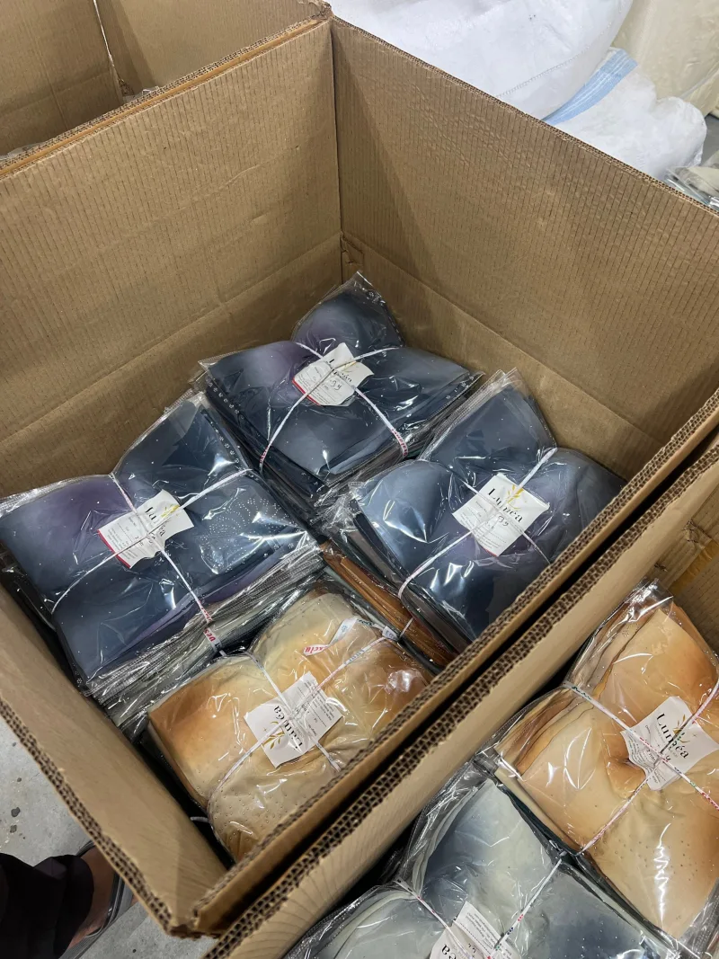 Cartons packed by design and colour